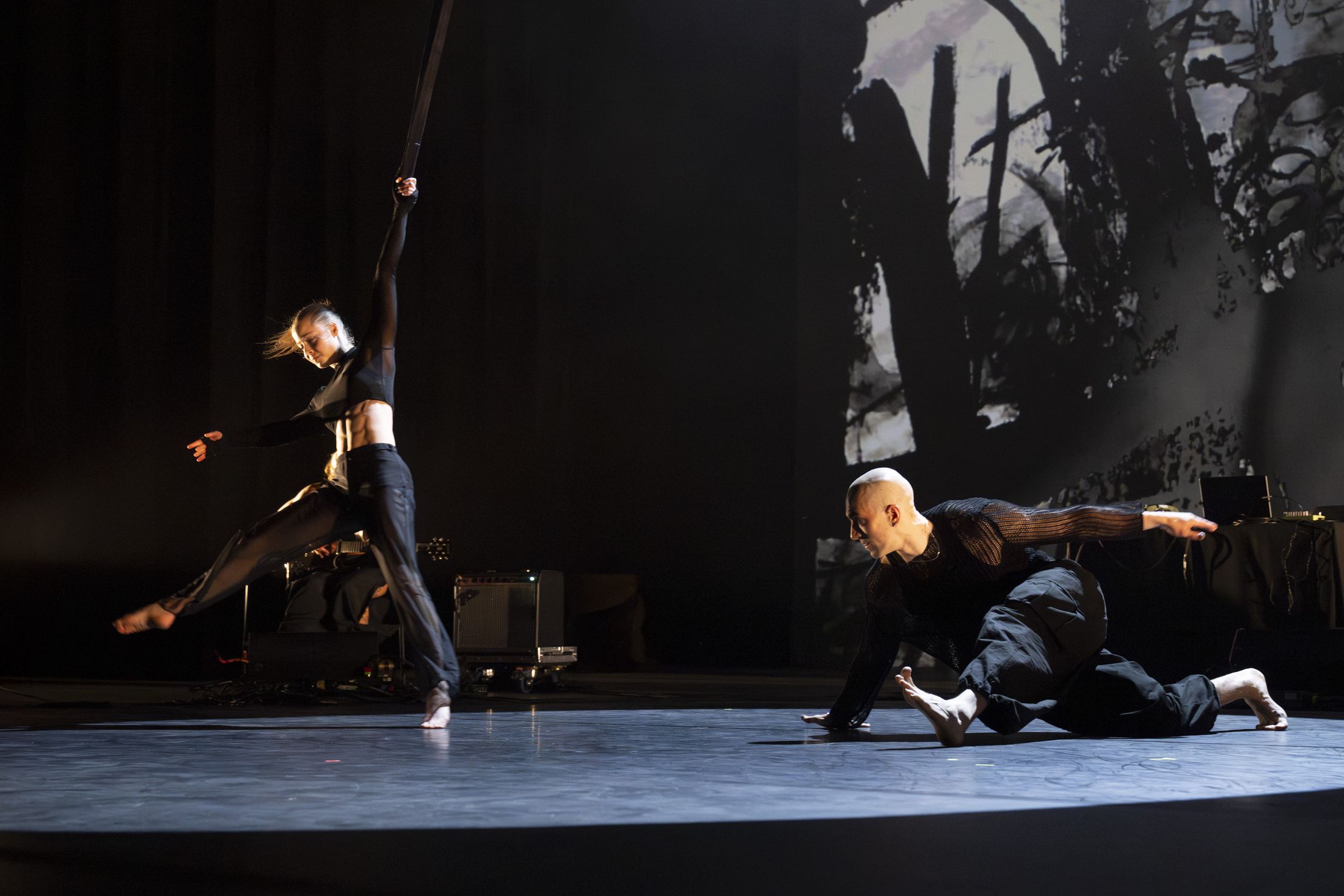 Contact dance across the stage floor