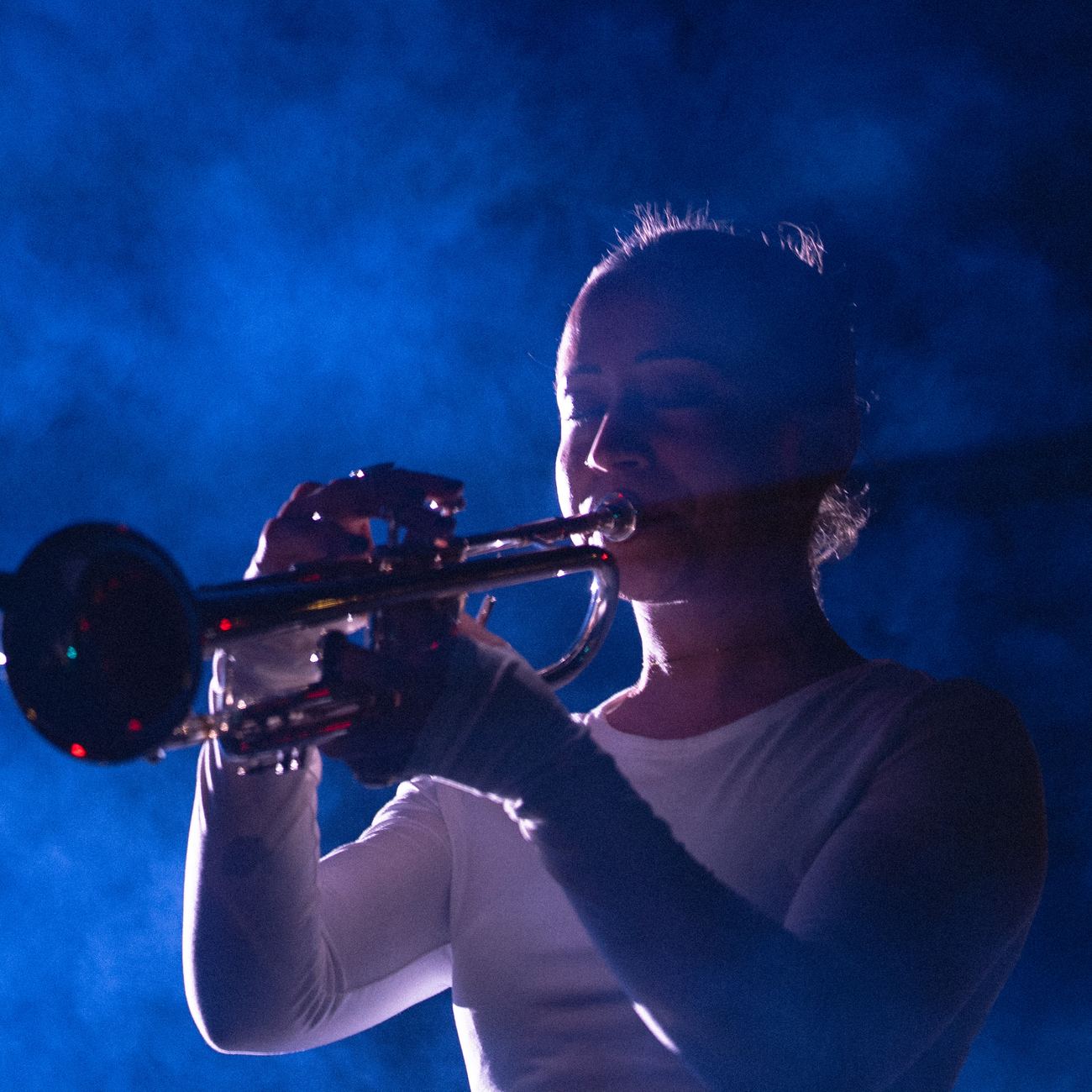 Briana Gillet on trumpet in blue haze